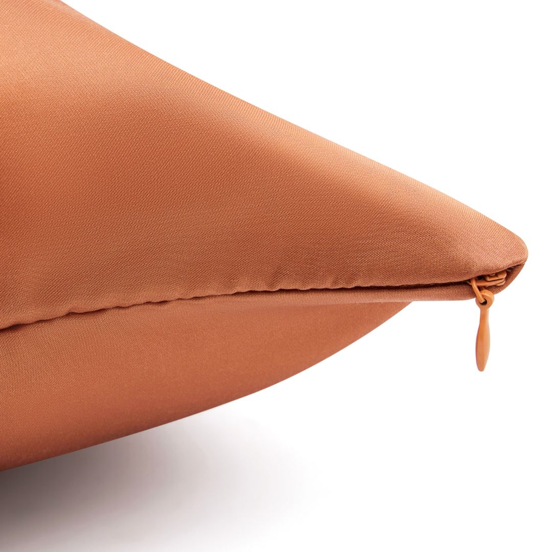 Terracotta plant-based silk pillowcase with hidden zipper on white background