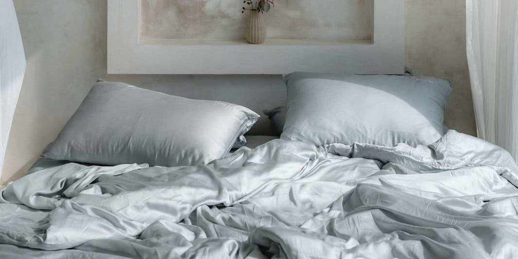 Bed sheet thread count guide showing soft Mynt Lab sheets on a white bed