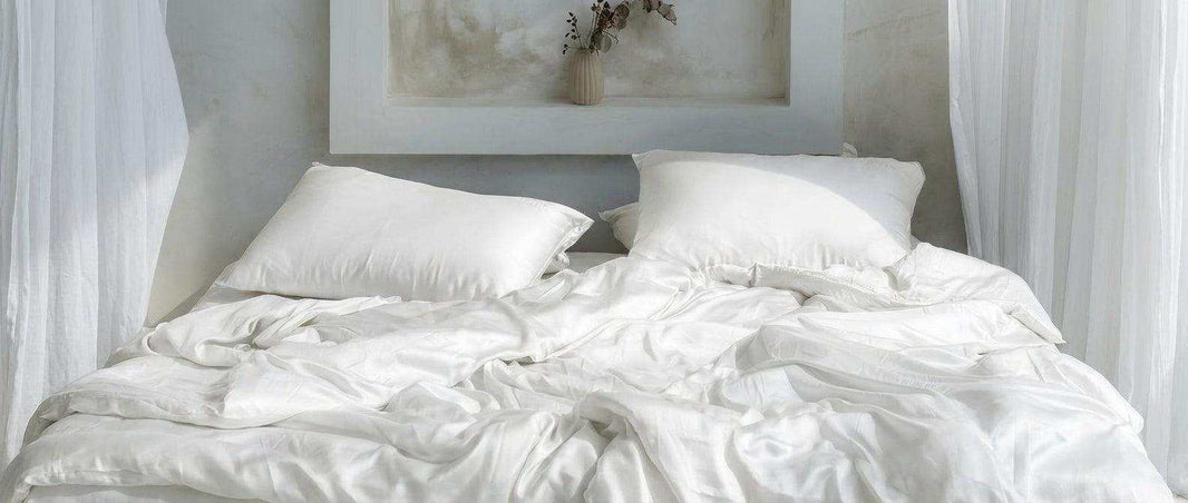 Person lying awake in bed struggling to sleep signs you're not sleeping well even if you think you are