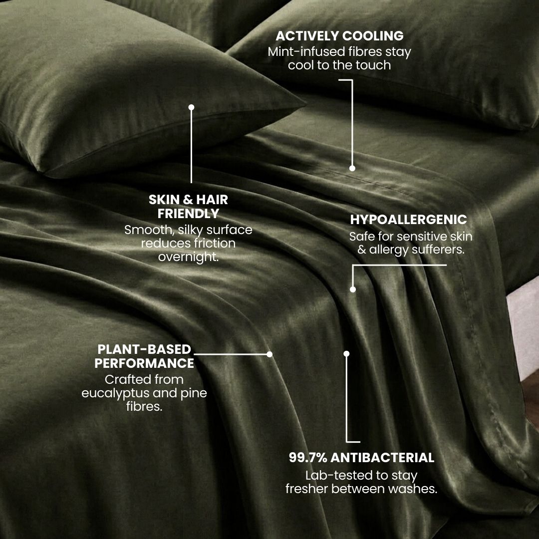 The MyntFusion™ Complete Sheet Set by Mynt Lab features dark green silk sheets and pillowcases that are actively cooling, skin & hair friendly, hypoallergenic, plant-based, and 99.7% antibacterial.