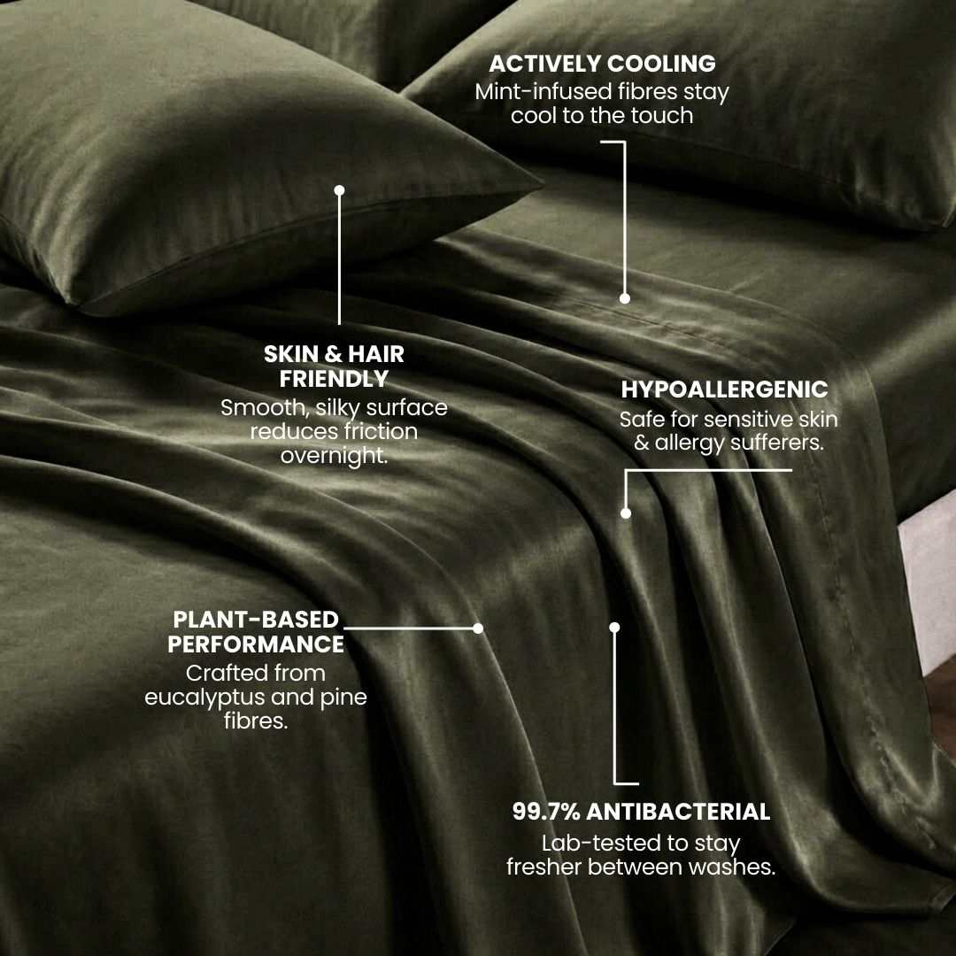 The MyntFusion™ Complete Sheet Set by Mynt Lab features dark green silk sheets and pillowcases that are actively cooling, skin & hair friendly, hypoallergenic, plant-based, and 99.7% antibacterial.