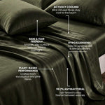 The MyntFusion™ Complete Sheet Set by Mynt Lab features dark green silk sheets and pillowcases that are actively cooling, skin & hair friendly, hypoallergenic, plant-based, and 99.7% antibacterial.