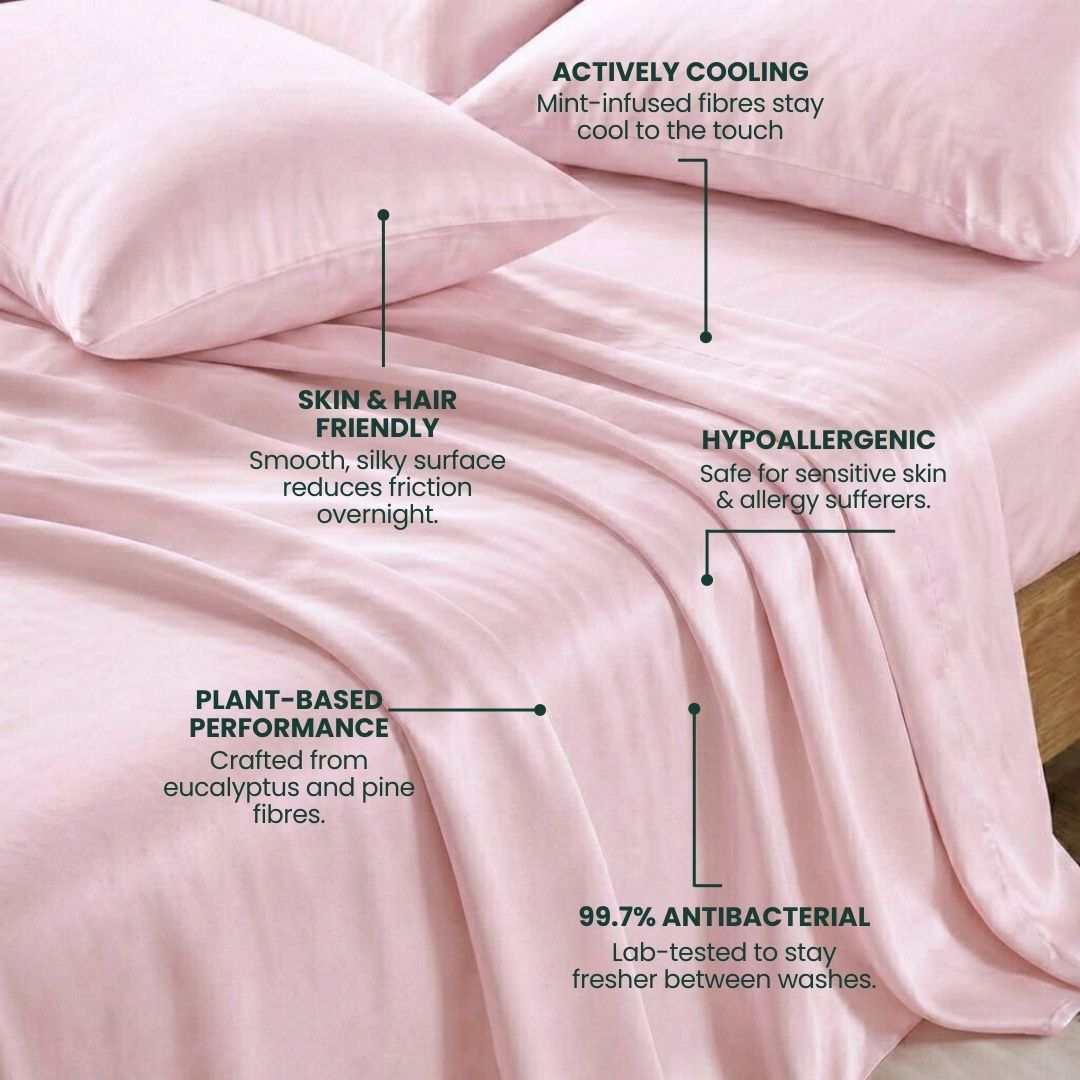 The Mynt Lab MyntFusion™ Complete Sheet Set features pink bed sheets and pillowcases crafted from plant-based, hypoallergenic fabric that's actively cooling, gentle on skin and hair, and provides 99.7% antibacterial protection.