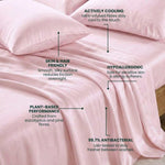 The Mynt Lab MyntFusion™ Complete Sheet Set features pink bed sheets and pillowcases crafted from plant-based, hypoallergenic fabric that's actively cooling, gentle on skin and hair, and provides 99.7% antibacterial protection.