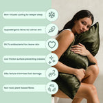 A woman hugs an olive green, silky pillow from the Deep Sleep Bundle. Six icons show its benefits: cooling, hypoallergenic, antibacterial, low-friction, silky texture, and non-toxic plant-based fibres for deeper sleep.