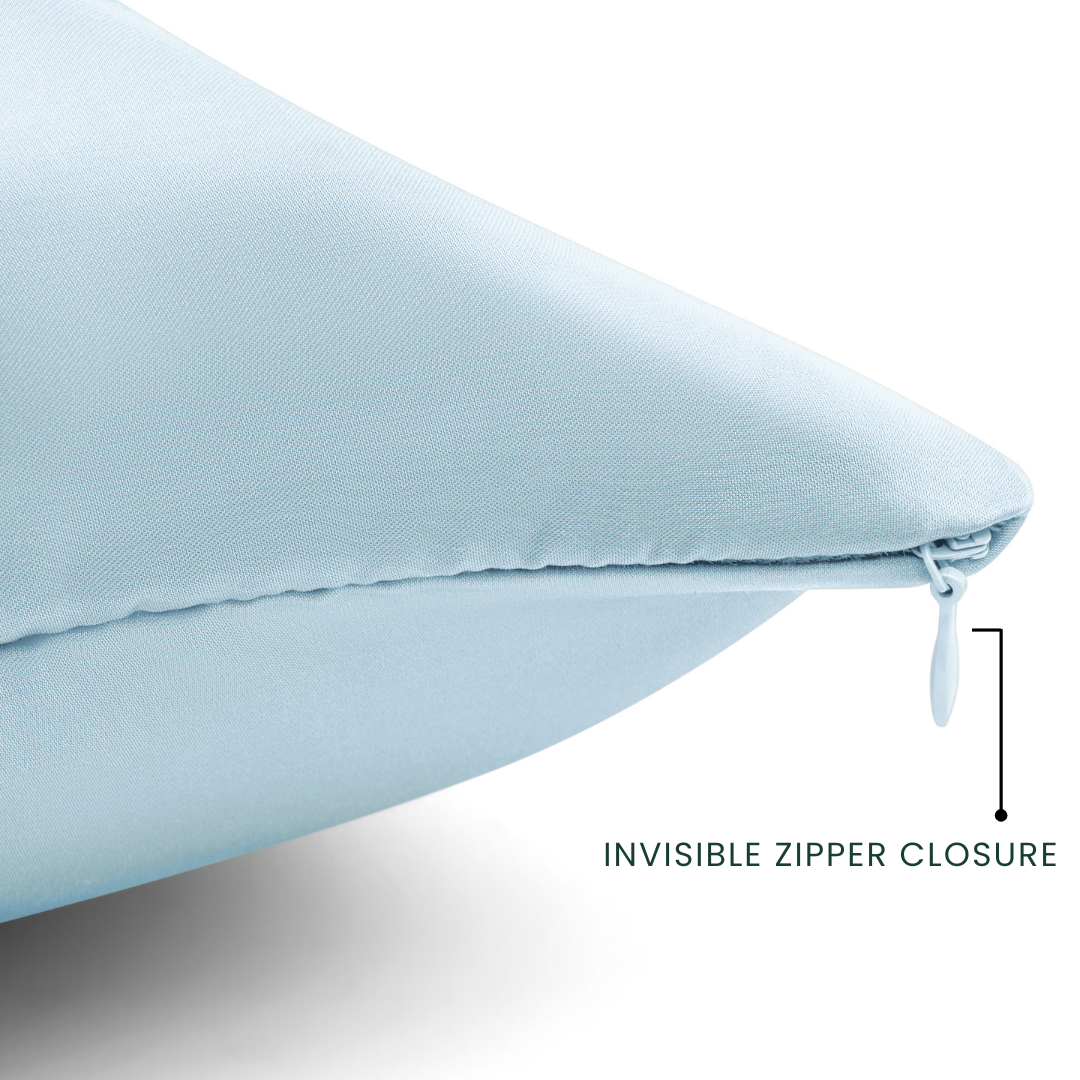 Light blue pillow with an invisible zipper closure on a white background
