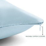 Light blue pillow with an invisible zipper closure on a white background
