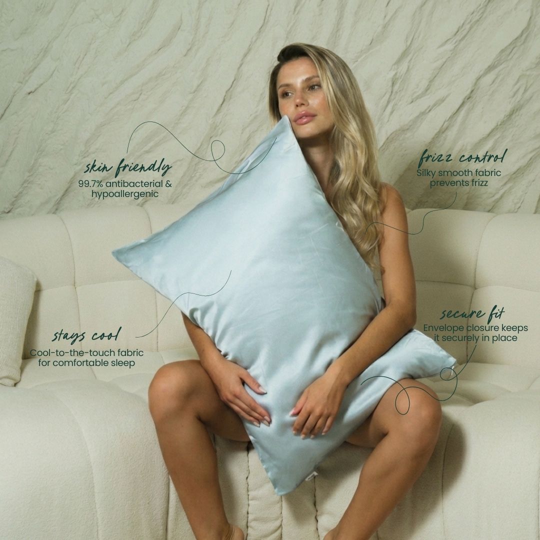Woman holding a light blue pillow with text about its features on a neutral background