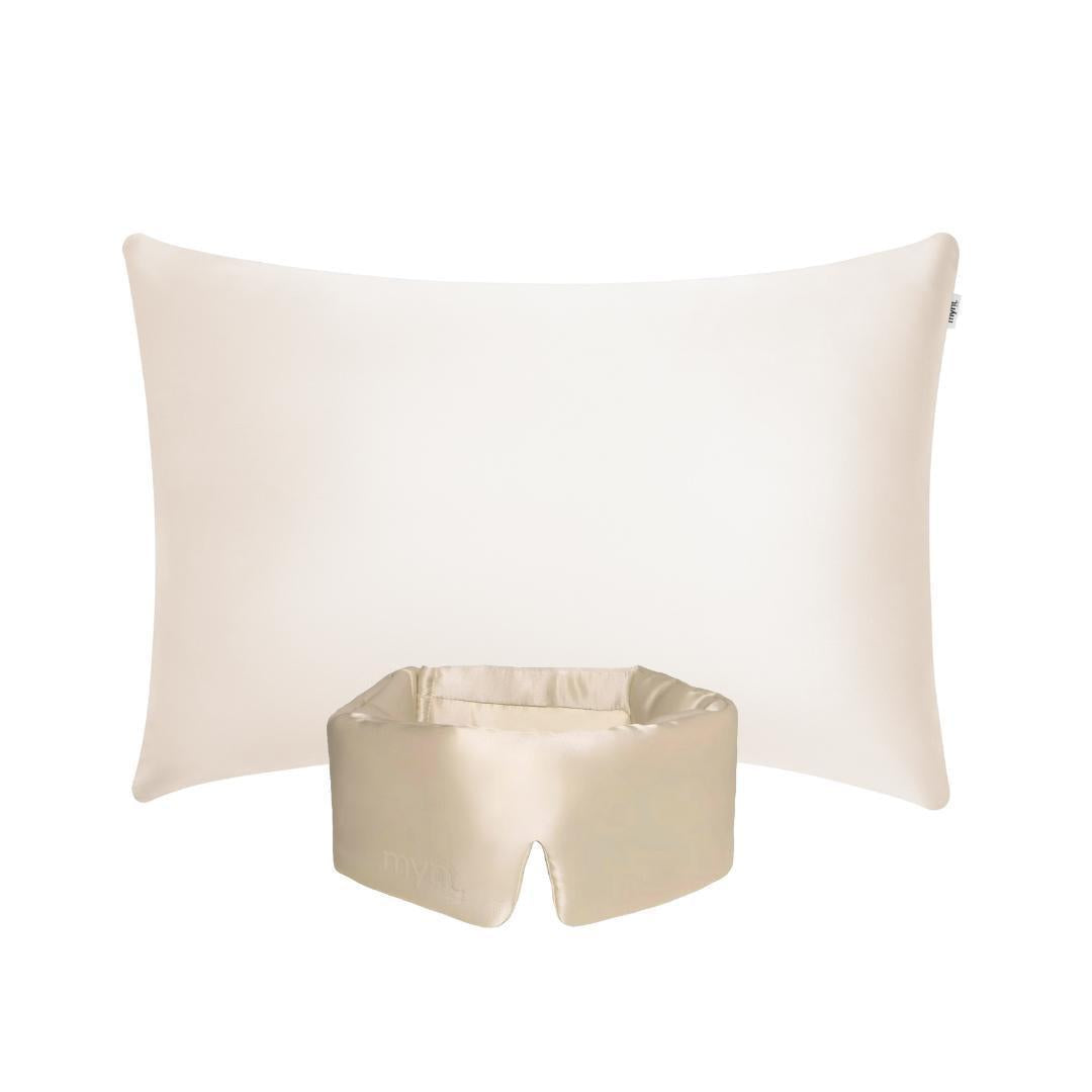 The Deep Sleep Bundle, featuring a sand rectangular pillow with a cooling case and a matching silky contoured blackout sleep mask, is displayed on a white background for optimal rest.