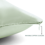 Light green pillow with an invisible zipper closure on a white background
