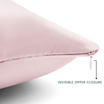 Pink pillow with an invisible zipper closure on a light gray background