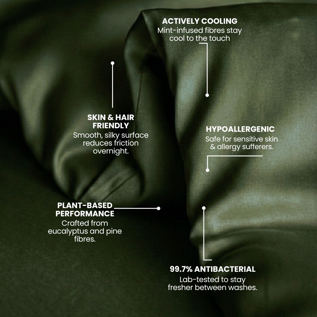 A close-up of smooth, dark green MyntFusion™ Duvet Cover by Mynt Lab, featuring actively cooling fabric - great for hot sleepers - skin & hair friendly, plant-based, hypoallergenic, and 99.7% antibacterial between washes.