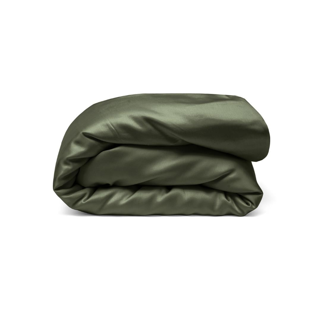 The Mynt Lab MyntFusion™ Duvet Cover | Double is displayed neatly folded in dark green satin or silk against a plain white background—an elegant, cool choice for hot sleepers.