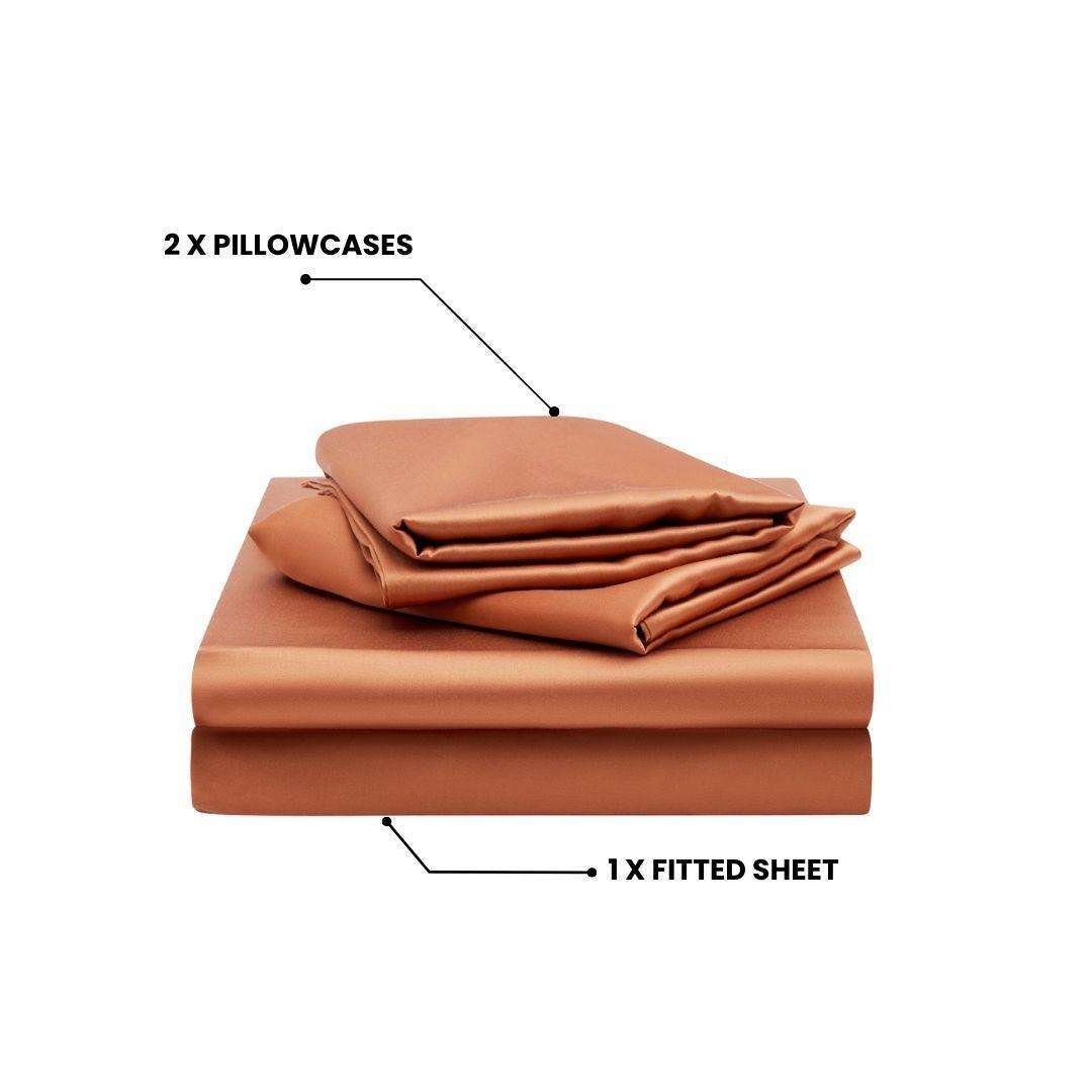 A terracotta Mynt Lab MyntFusion™ 3-piece fitted sheet set including two pillowcases and a deep pocket cooling fitted sheet, with labeled arrows pointing to each item on a white background.