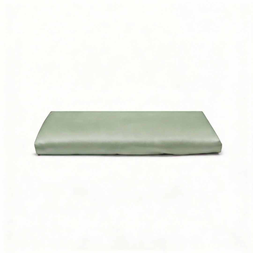 Folded MyntFusion™ flat sheet in a Sage Green, made from silky smooth, plant-based fabric.