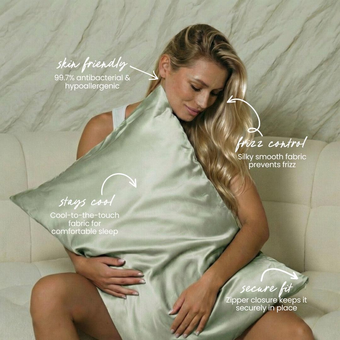 A woman hugs the Mynt Lab MyntFusion™ Pillowcase in light green. Text highlights skin-friendly, hypoallergenic, 99.7% antibacterial fibres, frizz reduction with silky-smooth fabric, cooling feel, and a secure zippered closure.