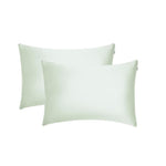 Two sage green rectangular pillowcases with a smooth, silky texture are placed side by side on a white background, ideal for beauty sleep and reducing frizz.