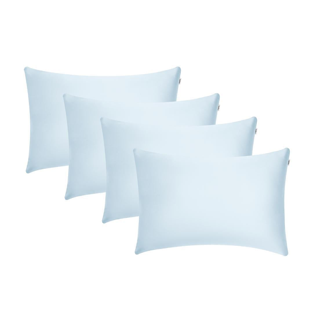Four light blue rectangular Pillowcases are arranged in two overlapping rows against a white background, offering the perfect setup for beauty sleep and helping you wake up with hydrated skin.