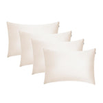 Four sand-coloured rectangular pillowcases arranged in a staggered row on a white background, perfect for beauty sleep and waking up with hydrated skin.