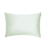 A light green rectangular pillowcase with a smooth surface, designed to enhance beauty sleep, displayed against a plain white background.