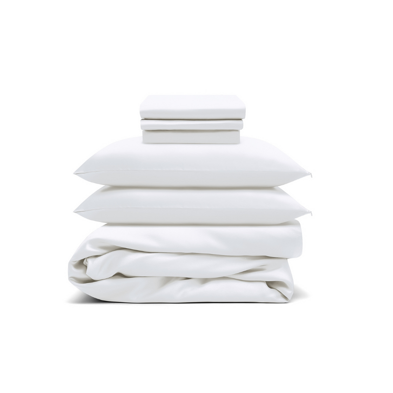 The Bedding Bundle features white antibacterial bedding: two folded sheets, two pillows with pillowcases, and a folded duvet, all neatly stacked against a white background.
