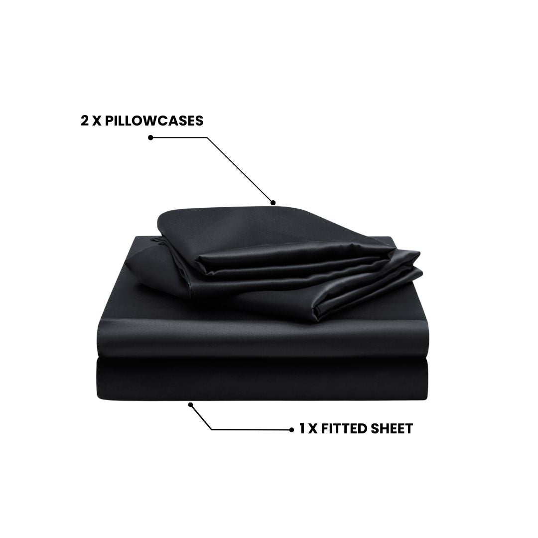 A neatly folded MyntFusion™ Fitted Sheet Set (3-Piece) by Mynt Lab in black, including a cooling deep-pocket fitted sheet and two pillowcases, each labeled with arrows identifying the items.