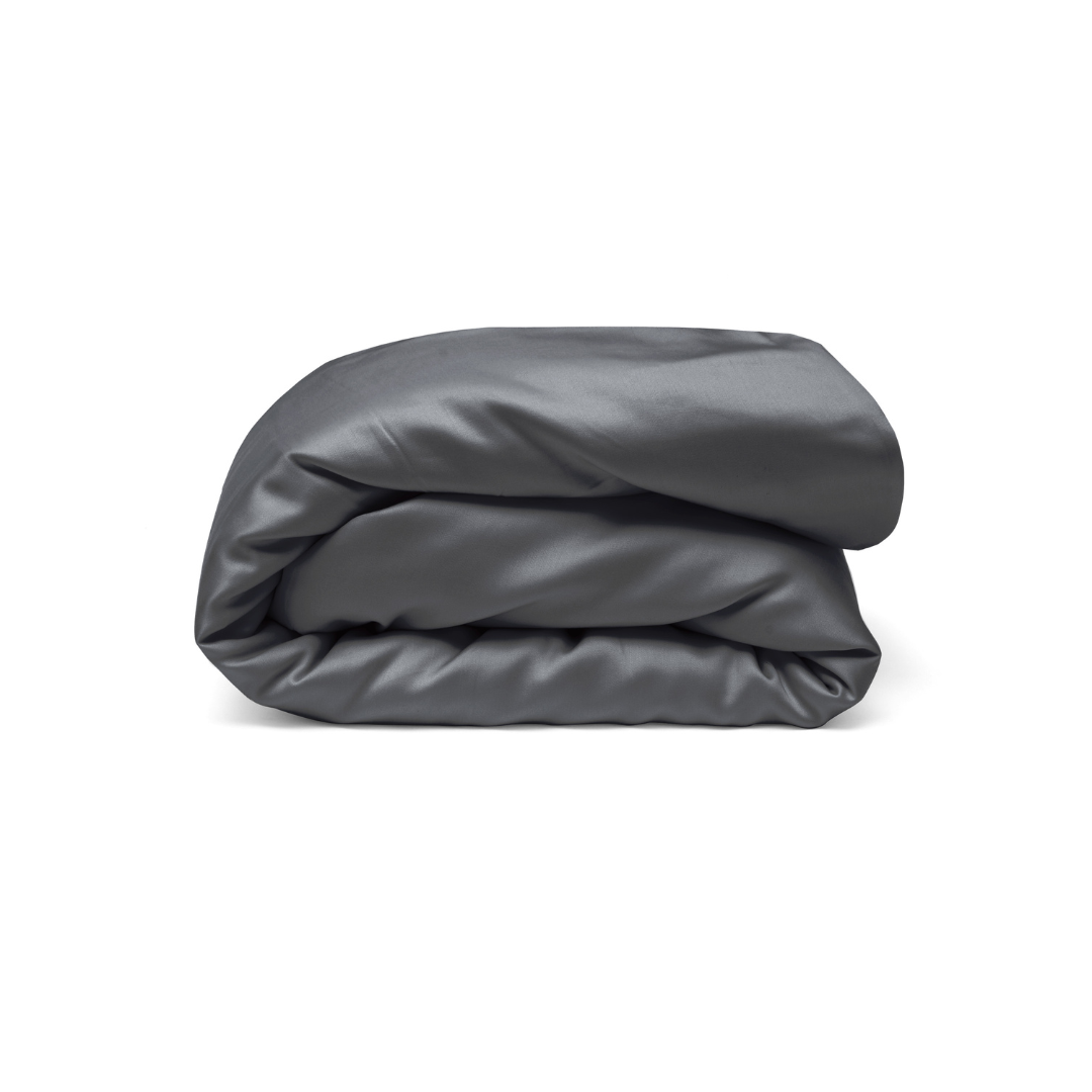 A neatly folded, dark gray comforter or blanket is shown against a plain white background.