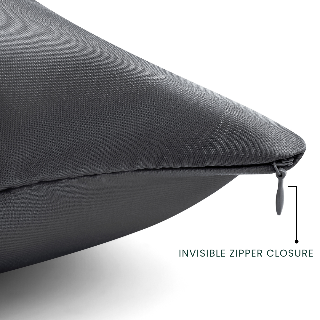 Charcoal pillow with an invisible zipper closure on a white background