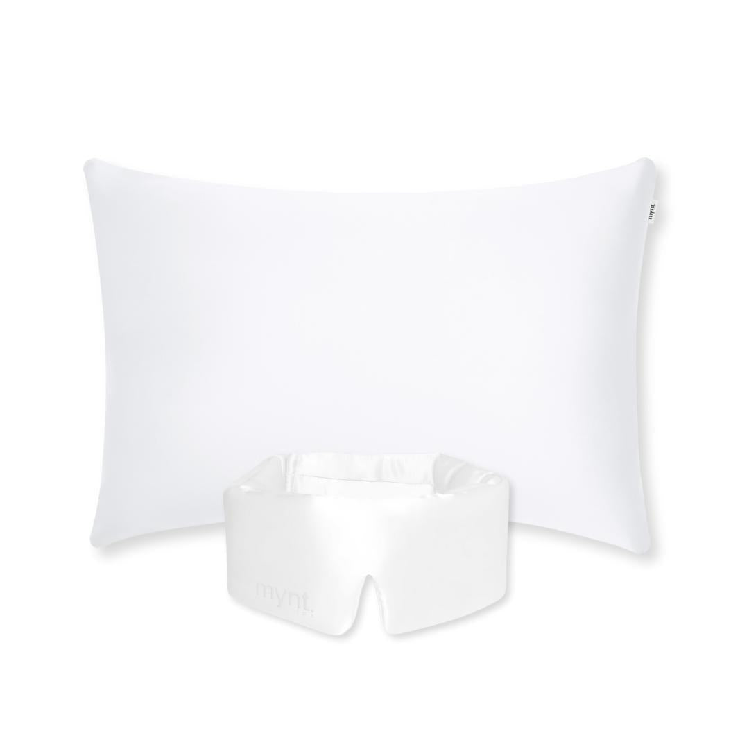The Deep Sleep Bundle features a rectangular white pillow with a cooling pillowcase and a matching silky sleep mask, all displayed on a light grey background - deal for achieving deep sleep.