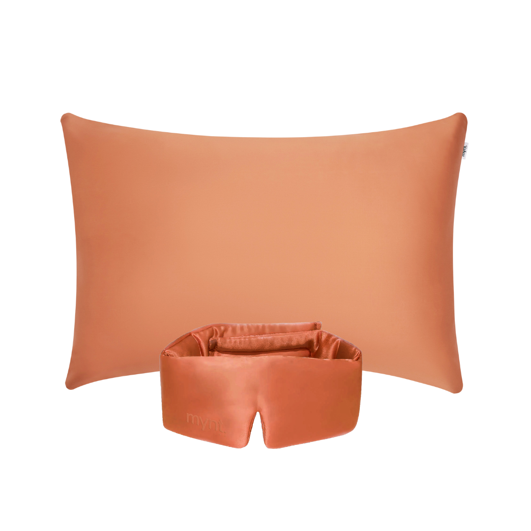 The Deep Sleep Bundle features a terracotta cooling pillowcase and a matching blackout sleep mask, both shown on a white background - ideal for deep sleep and nighttime comfort.