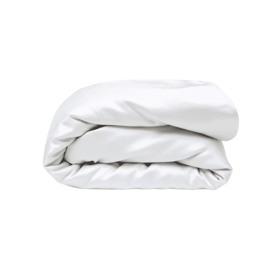 A neatly folded, fluffy white Duvet Cover with antibacterial protection is displayed on a plain white background.