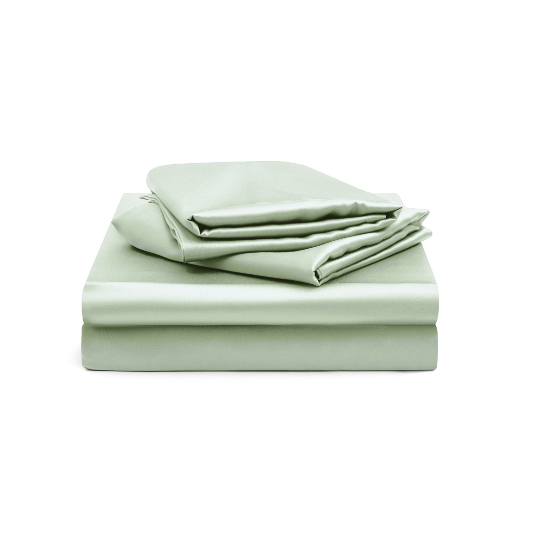The Fitted Sheet Set features silky soft light green sheets, including a fitted sheet and two pillowcases, displayed neatly against a white background.
