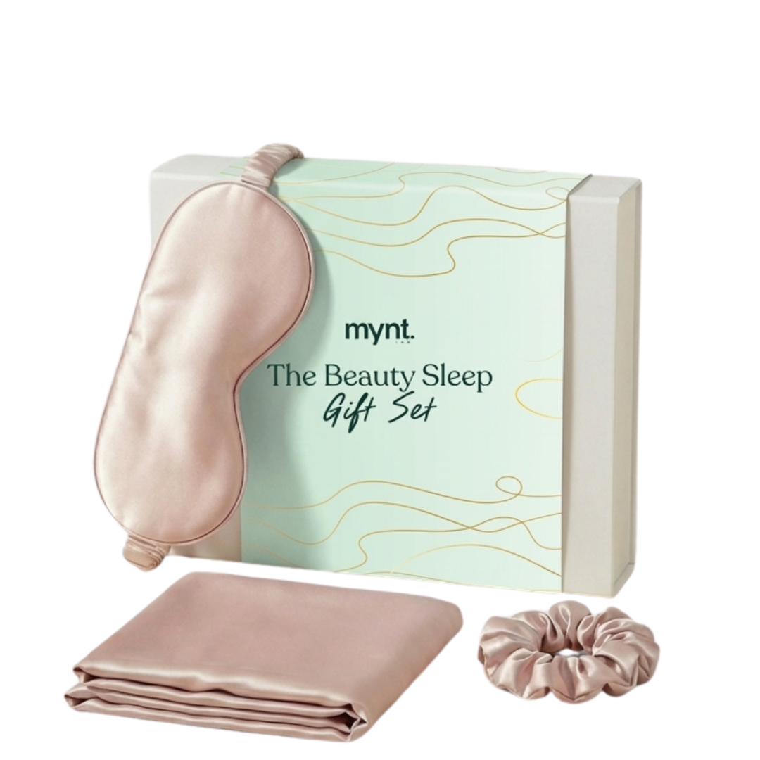 The Beauty Sleep Gift Set by Mynt Lab includes a silky pink eye mask, matching pillowcase, and scrunchie - essentials for a restful night’s sleep. Boxed and ready to gift.
