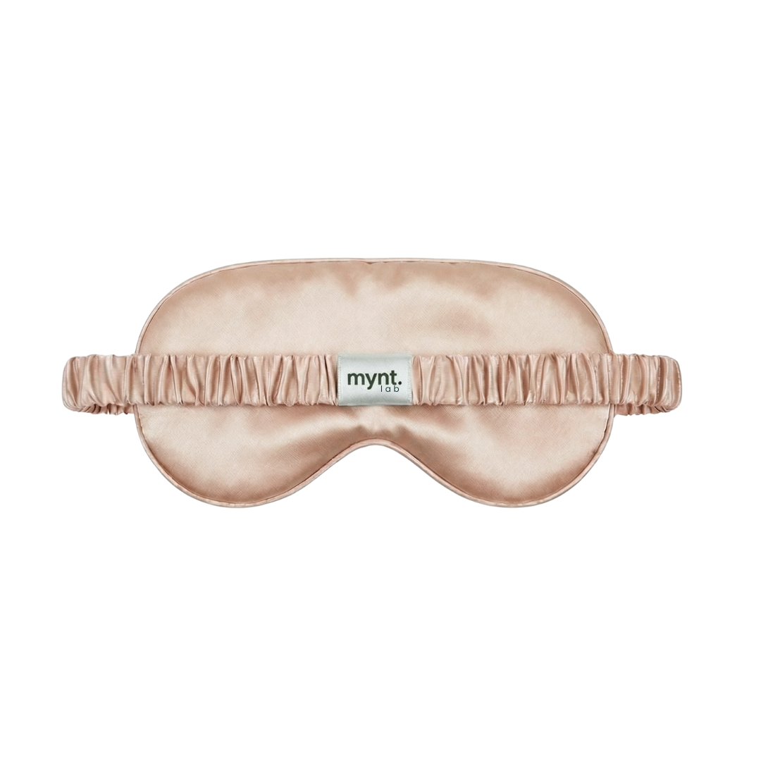 Dusty rose eye mask with 'mynt lab' label on a white background