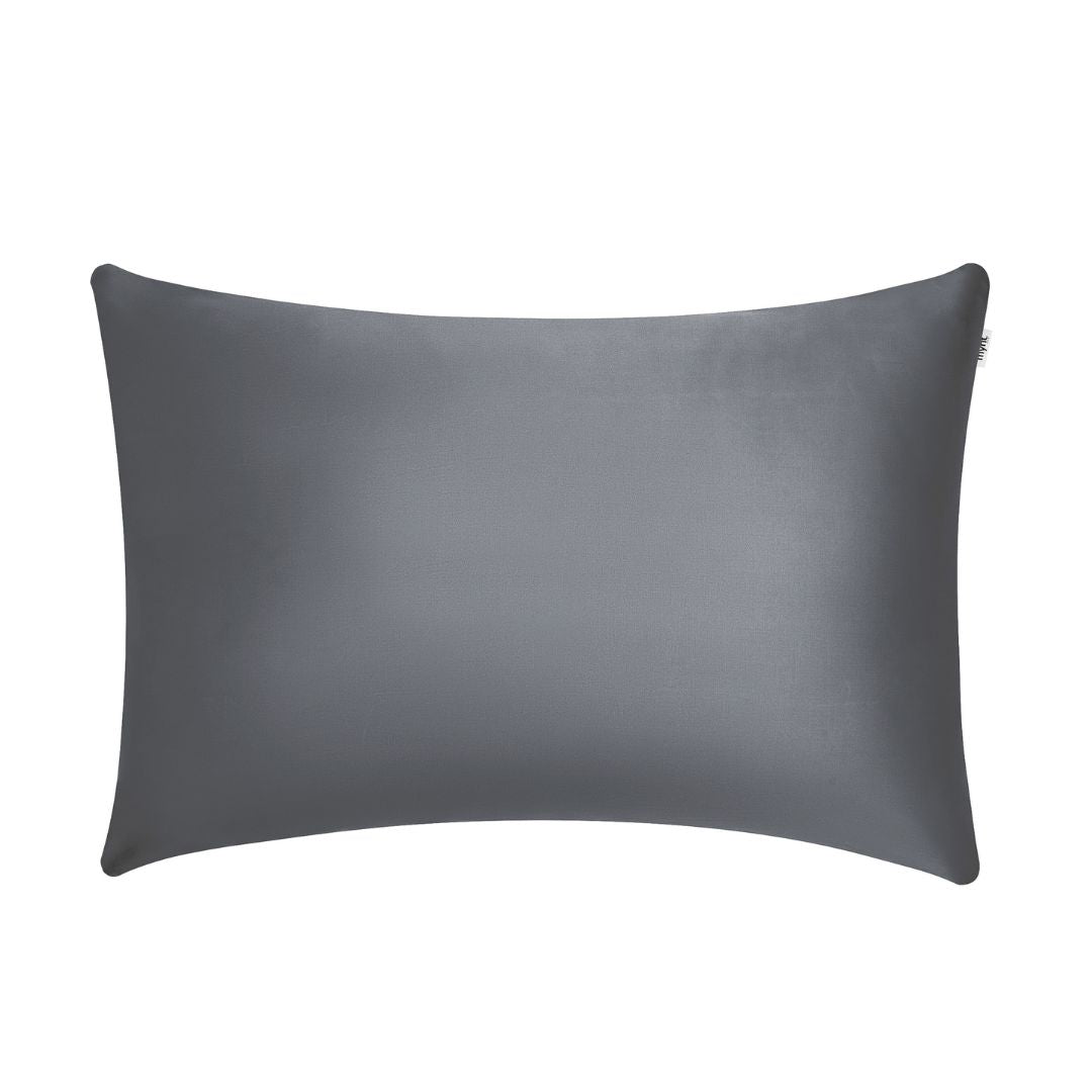 The Mynt Lab Pillowcase is a rectangular, dark gray satin cover displayed on a white background. Its smooth, shiny fabric reduces frizz and promotes beauty sleep, with a zipper on the upper right edge.