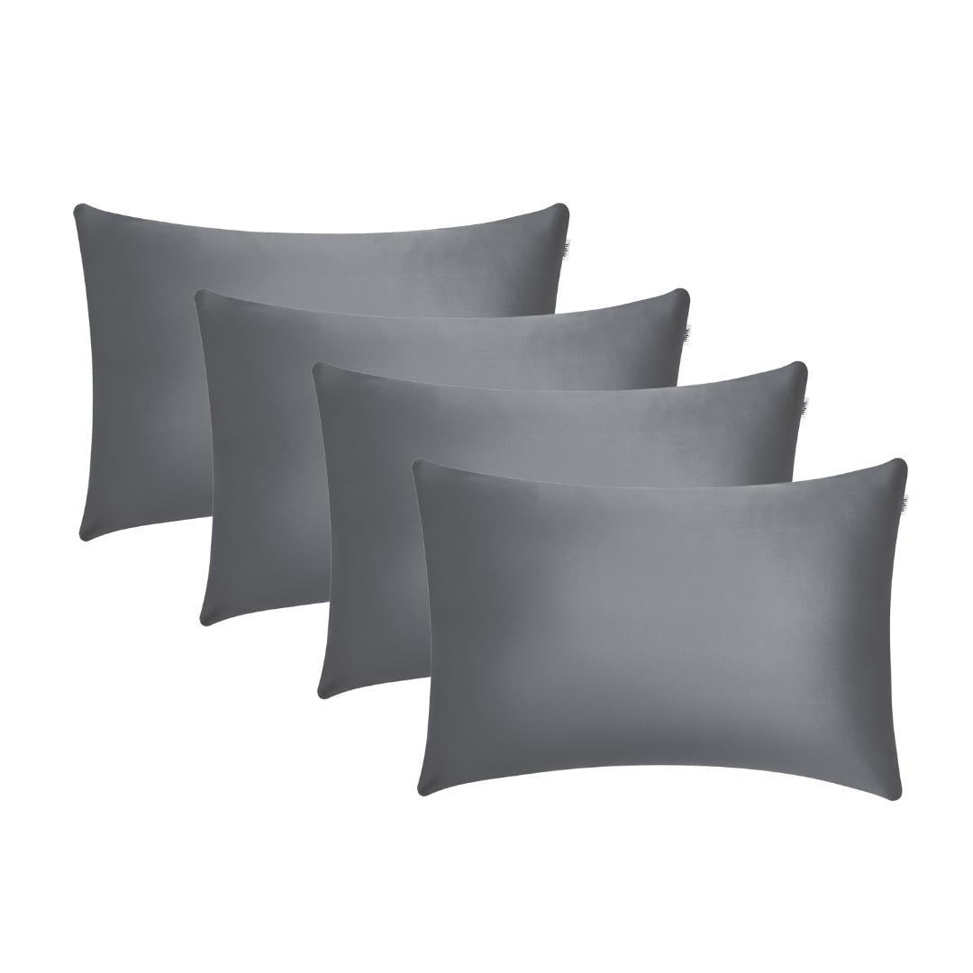 Four charcoal rectangular Pillowcases are arranged in a staggered formation on a white background, promoting beauty sleep and helping reduce frizz for smoother hair.