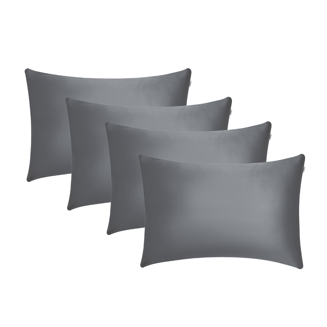 Four charcoal rectangular Pillowcases are arranged in a staggered formation on a white background, promoting beauty sleep and helping reduce frizz for smoother hair.