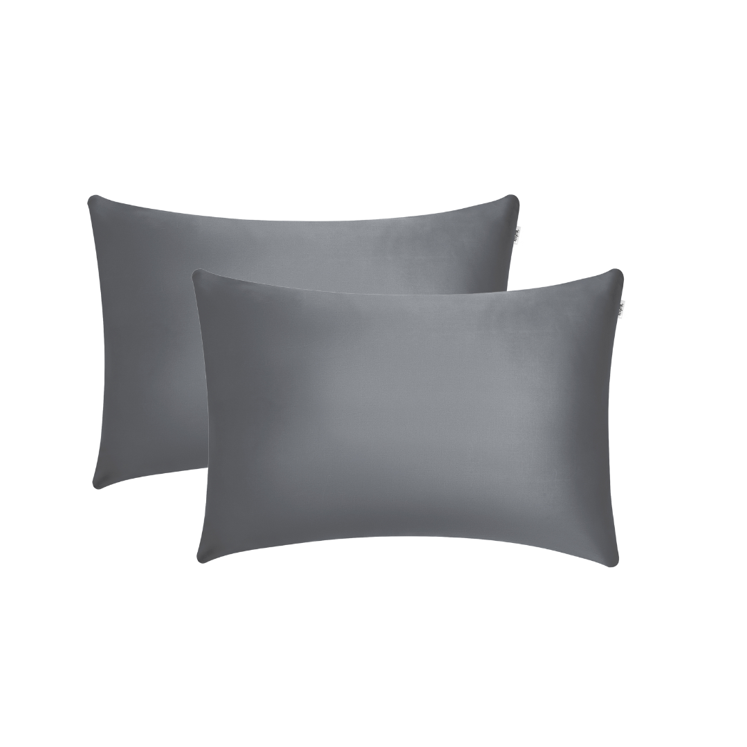 Two charcoal rectangular Pillowcases are displayed overlapping on a white background, ideal for beauty sleep and reducing frizz overnight.