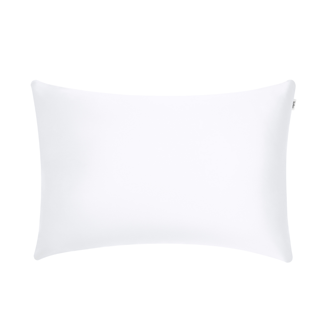 A plain white rectangular Pillowcase on a light gray background, viewed from above—perfect for beauty sleep and waking up to hydrated skin.