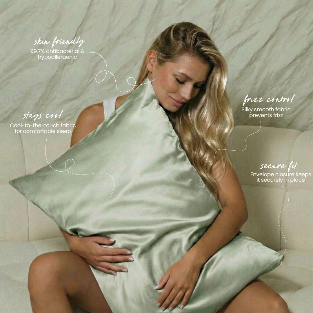Woman holding a sage green silky pillow with text about its features on a neutral background