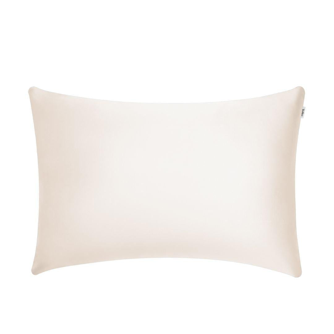 A rectangular, ivory-colored pillow with smooth, slightly shiny fabric, displayed against a white background.
