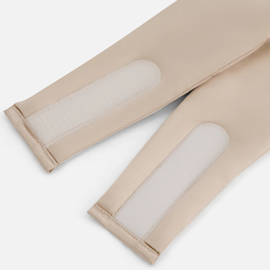 Close-up of two sand Sleep Mask fabric straps with rectangular white mesh patches, designed to block light - ideal as a sleep mask accessory for deep sleep. Displayed on a white background.
